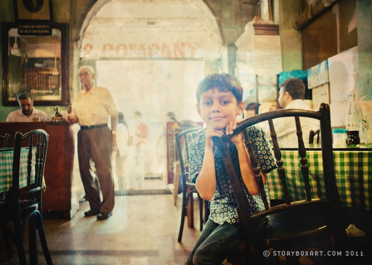 Boy at Cafe Britannia in Mumbai