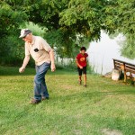 boy with grandpa at lake